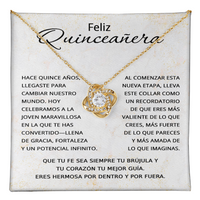 Load image into Gallery viewer, Love Knot pendant necklace for 15th birthday gift in a standard gift box with a bilingual Spanish message card on a marble and gold background
