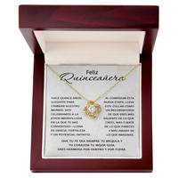 Load image into Gallery viewer, 14k white gold finish Love Knot necklace for Quinceañera in a luxury mahogany-style box with a built-in LED light and Spanish 'Mis Quince' message card
