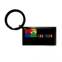 Load image into Gallery viewer, Autism Usa Flag Keychain – front view
