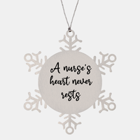 Load image into Gallery viewer, Nurse Christmas Ornament A nurses heart never rests Ornament Appreciation Gift Nurse's Day Coworker Colleague Snowflake Ornament – front view
