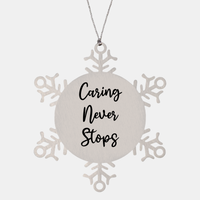 Load image into Gallery viewer, Nurse Christmas Ornament Caring never stops Ornament Appreciation Gift Nurse's Day Coworker Colleague Snowflake Ornament – front view

