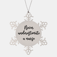 Load image into Gallery viewer, Nurse Christmas Ornament Never underestimate a nurse Ornament Appreciation Gift Nurse's Day Coworker Colleague Snowflake Ornament – front view
