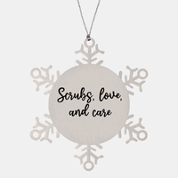 Load image into Gallery viewer, Nurse Christmas Ornament Scrubs love and care Ornament Appreciation Gift Nurse's Day Coworker Colleague Snowflake Ornament – front view
